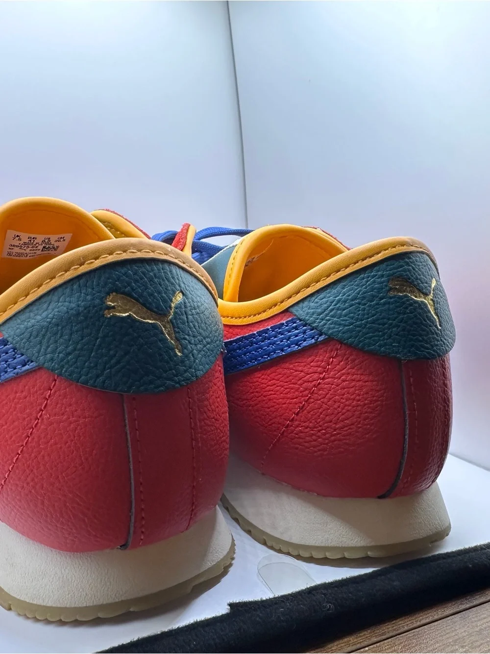 Puma Kids Red Sneakers with Blue Accents